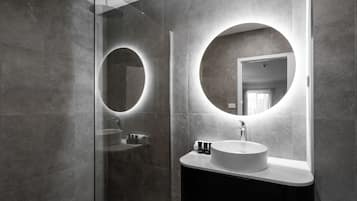 Designer toiletries, hair dryer, towels, soap