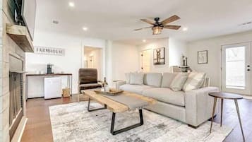 TV, fireplace, books, offices