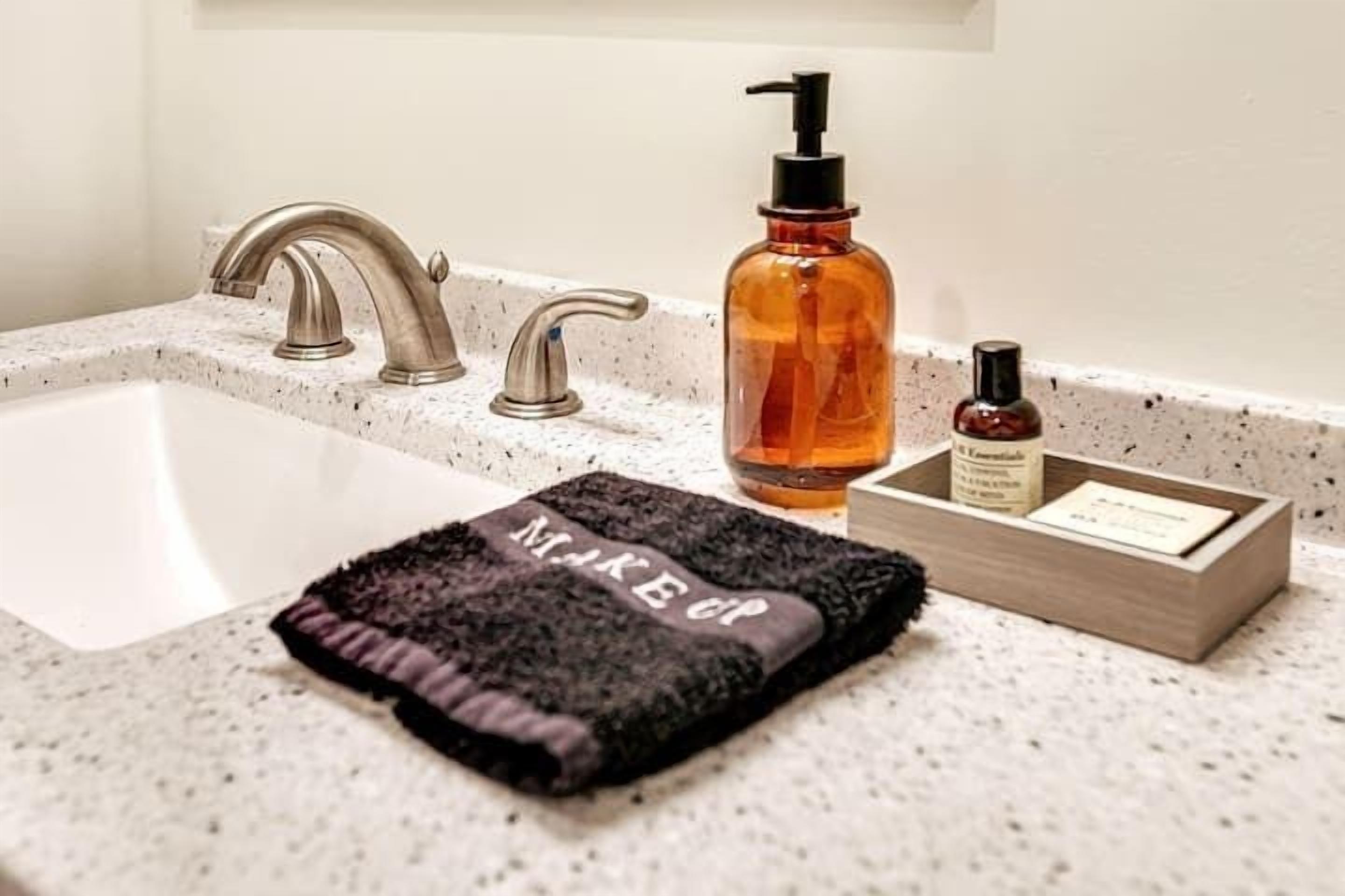 Shower, hair dryer, towels, shampoo