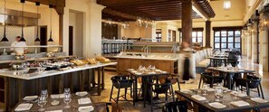 Enjoy a casual yet elegant dining experience with a variety of seating options.