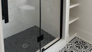 Shower, eco-friendly toiletries, hair dryer, towels