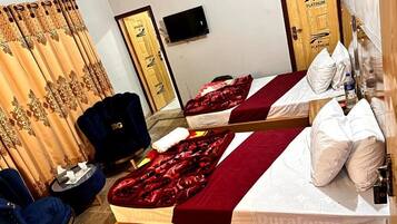 Deluxe tweepersoonskamer | Geluiddichte muren, een strijkplank/strijkijzer, gratis wifi