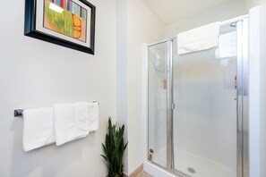 Bathtub, eco-friendly toiletries, hair dryer, towels