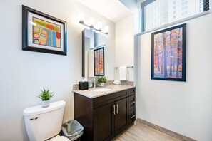 Bathtub, eco-friendly toiletries, hair dryer, towels