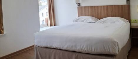 Premium bedding, desk, free WiFi, bed sheets