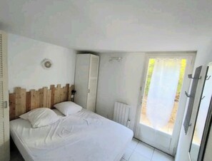 2 dormitorios, tabla de planchar con plancha, wifi