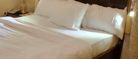 Economy Room | 1 bedroom, in-room safe, free WiFi