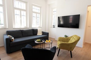 Apartamento, 2 quartos | Sala de estar