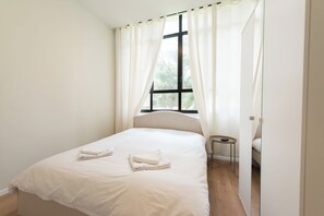 Apartamento, 2 quartos | Vista do quarto