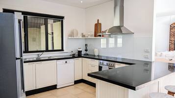 Oven, dishwasher, dining tables