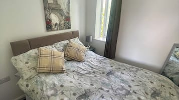 Standard Apartment | Living area | 40-inch LED TV with digital channels, toys