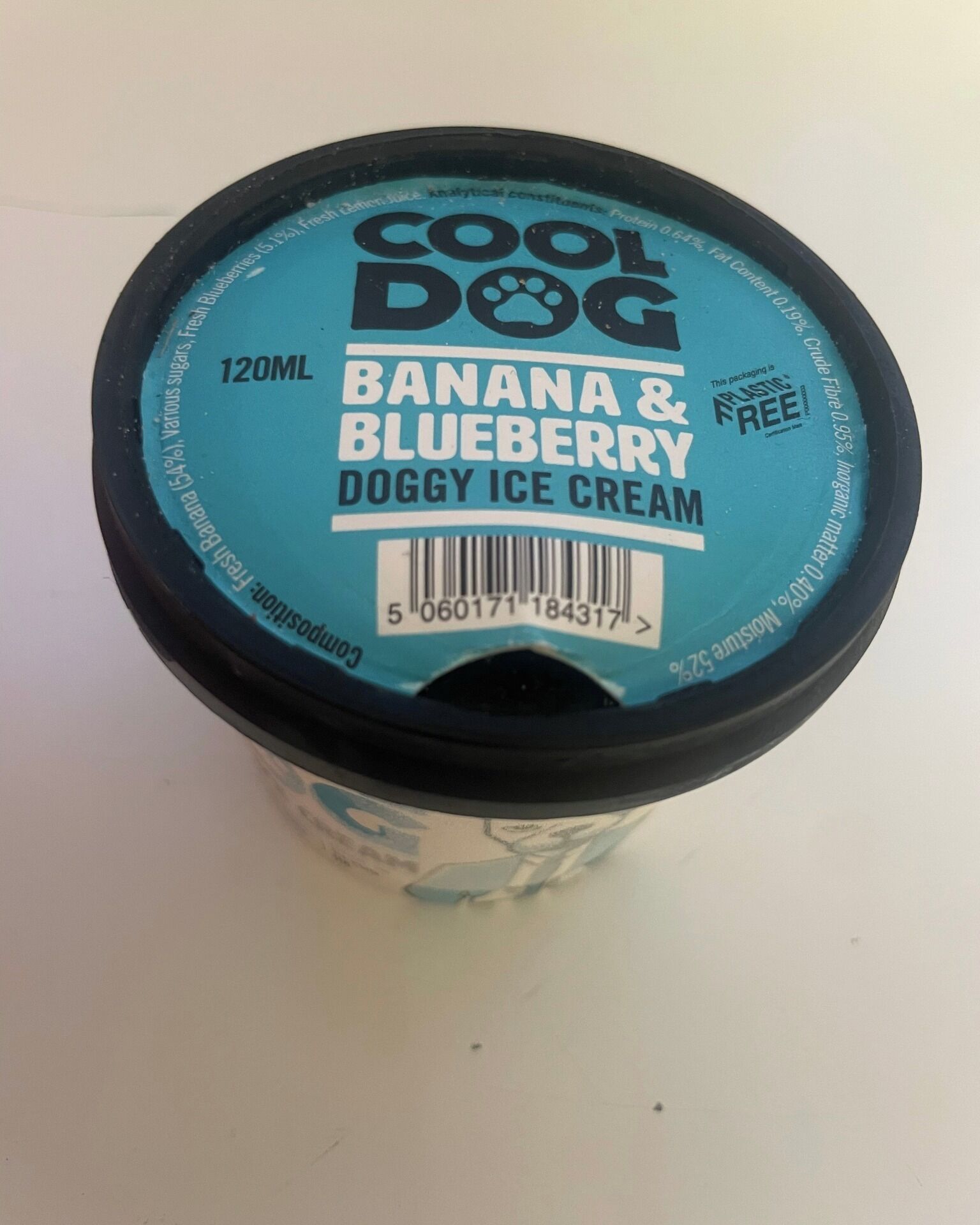 A container of Cool Dog Banana & Blueberry Doggy Ice Cream.