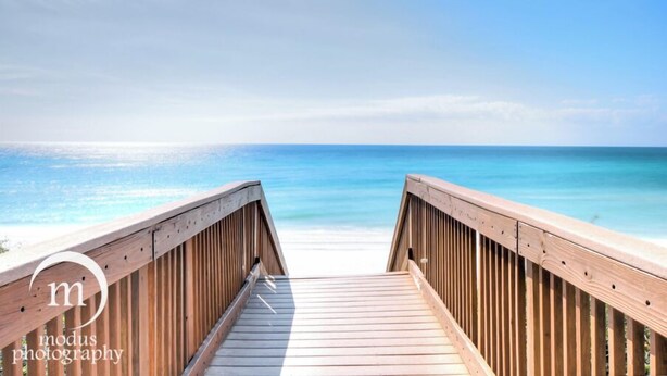 A wooden boardwalk leading to a beach with clear blue water. - GolfCourseView~6 Person GolfCart~HeatedPool*~Hot tub~FREE GOLF+Pet considered (Miramar Beach)
