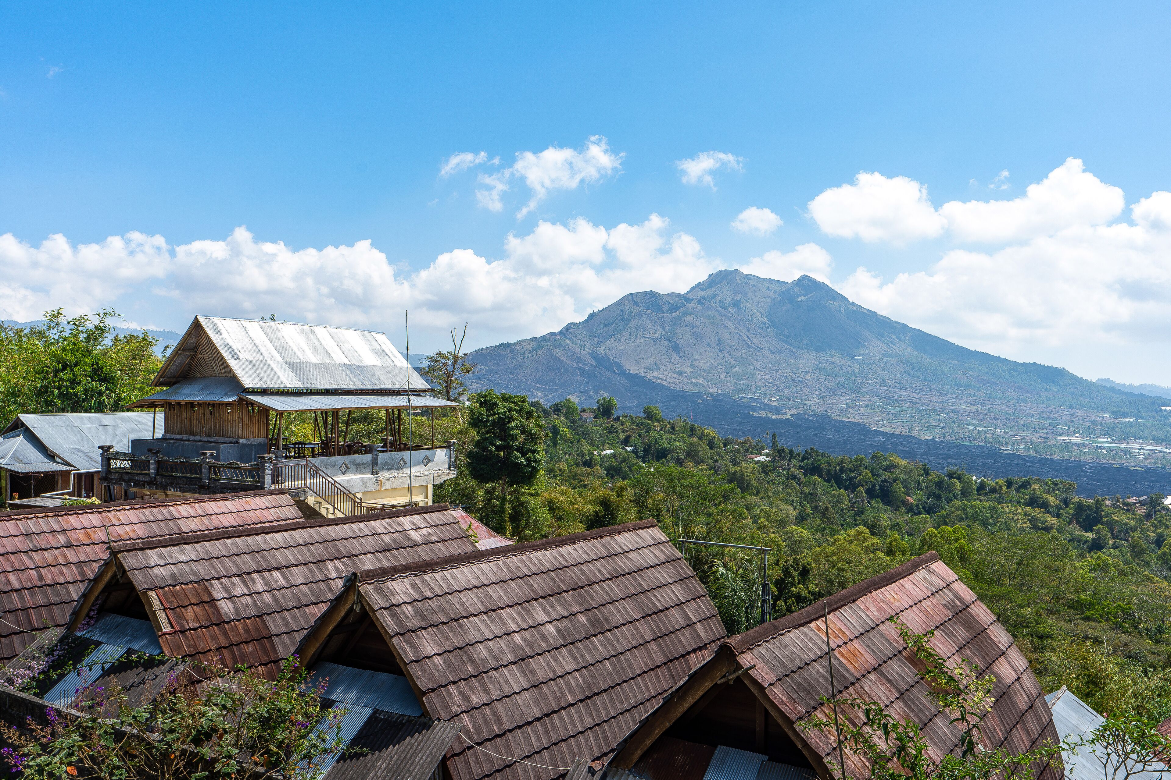 A mountainous landscape with a prominent peak.