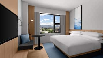 Room, 1 King Bed | In-room safe, laptop workspace, blackout curtains, iron/ironing board