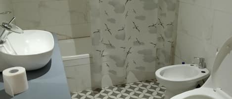 Jetted bath, bidet, toilet paper