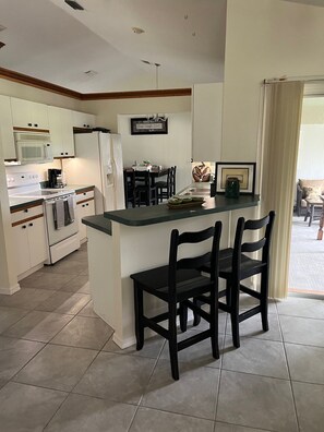 Fridge, microwave, oven, stovetop - Spacious home and country setting just minutes from The Villages. (Lady Lake)