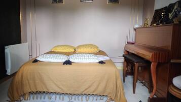 1 chambre, fer et planche à repasser, Wi-Fi gratuit, draps fournis