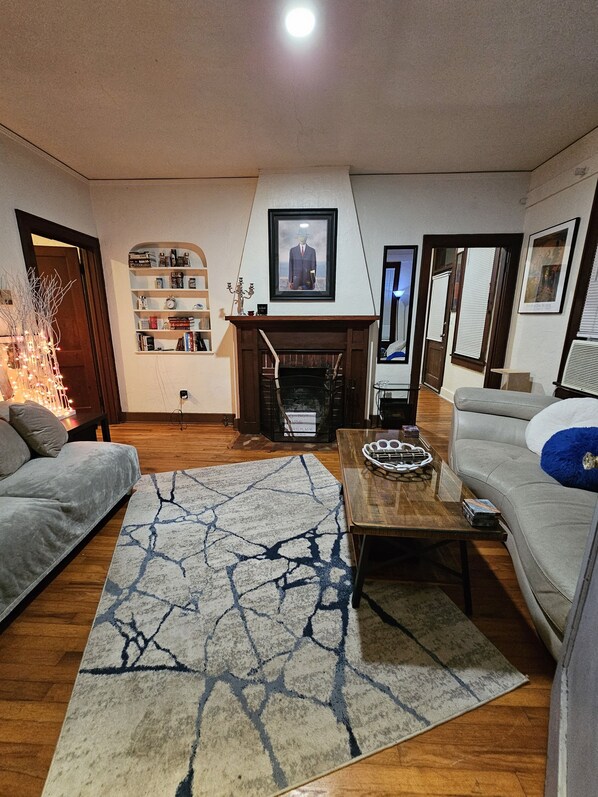 Smart TV, fireplace, books