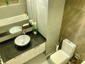 Hair dryer, bidet, towels, soap - City Skyline View | Beautiful 1BR Apartment (Dubai)