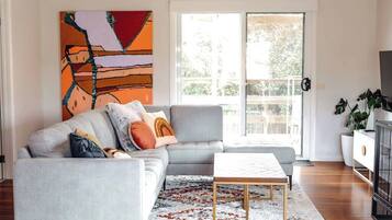 TV, fireplace, books, offices