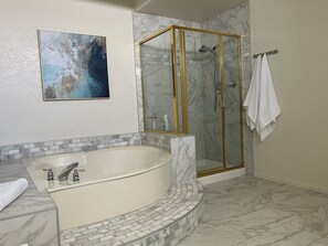Shower, hair dryer, towels, soap