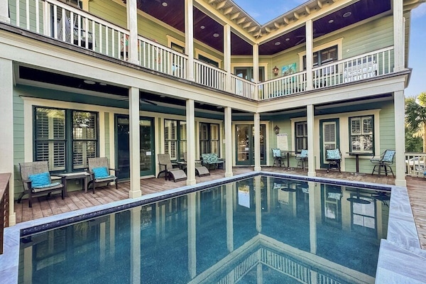 Welcome to 2803 Palm Blvd. A private pool and hot tub invite relaxation and fun afternoons!