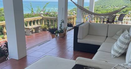 Private 1-acre beach villa with breathtaking views, waking distance from beach