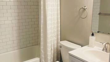 Hair dryer, towels, soap, shampoo