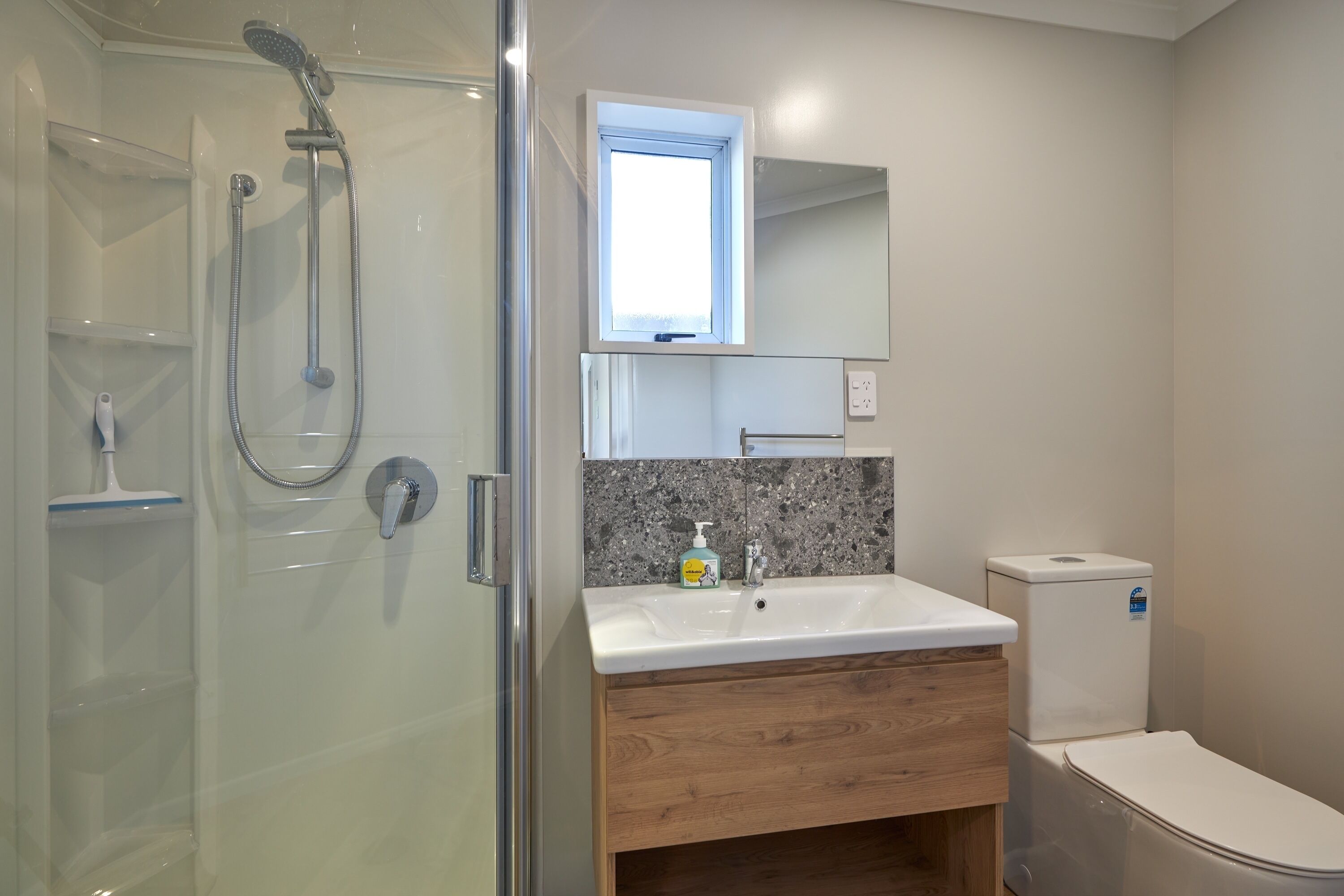 Shower, hair dryer, towels, toilet paper