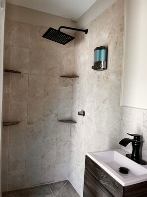Shower, towels, soap, shampoo