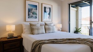 2 quartos, ferros/tábuas de passar roupa, roupa de cama