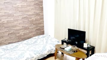 Blackout curtains, free WiFi, bed sheets