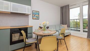 Apartment, 1 Bedroom, Balcony | Private kitchen | Coffee/tea maker, toaster, waffler maker, cookware/dishes/utensils