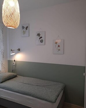 1 habitación y ropa de cama 