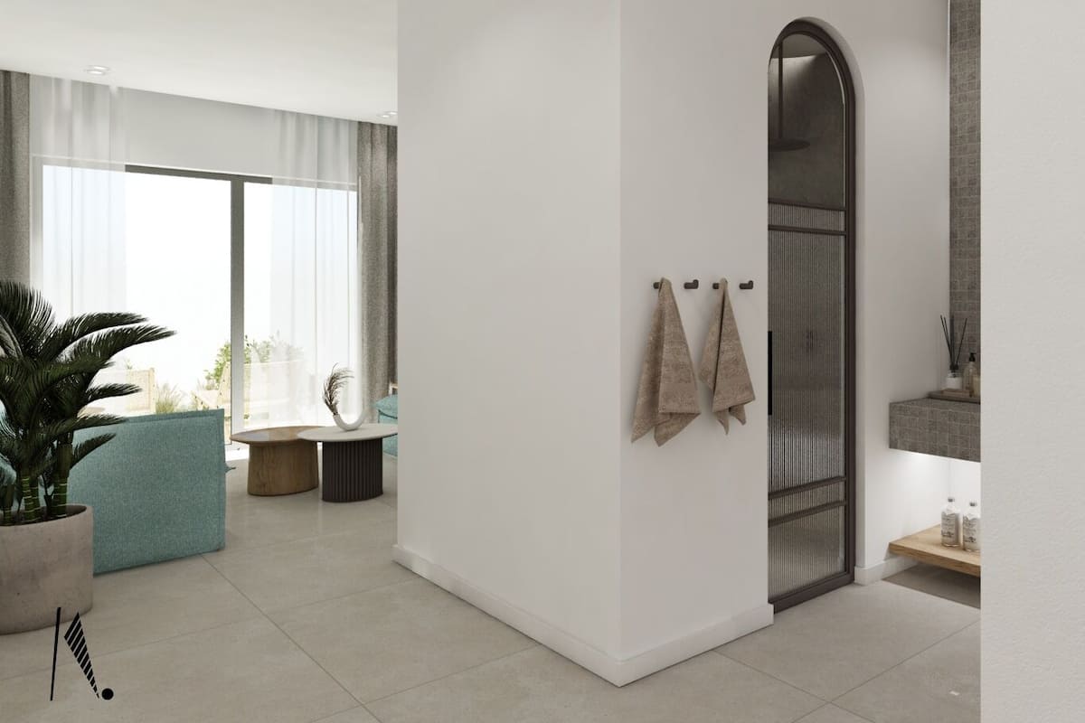 A modern, minimalist bathroom with a large mirror, a towel rack, and a small shelf with toiletries.