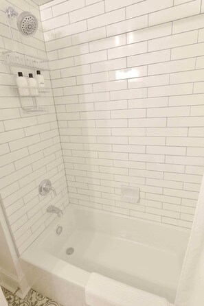 Bathtub, hair dryer, towels