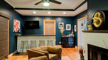 Smart TV, fireplace, books