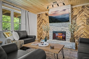 Smart TV, chimenea, libros y oficina 