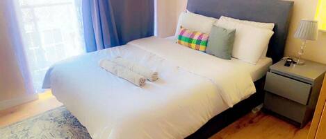 Departamento, 2 camas Queen size | 2 habitaciones, tabla de planchar con plancha y wifi gratis