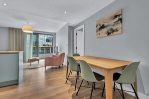 Deluxe Apartment, 2 Bedrooms, Kitchenette, City View | Living area