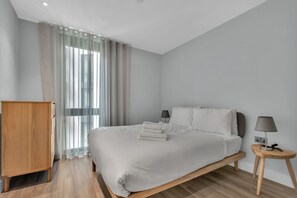 Deluxe Apartment, 2 Bedrooms, Kitchenette, City View | 2 bedrooms, desk, free WiFi, bed sheets