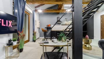 Premium Apartment | Living area | 50-inch LED TV with cable channels