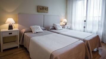 1 dormitorio, tabla de planchar con plancha, wifi gratis y ropa de cama