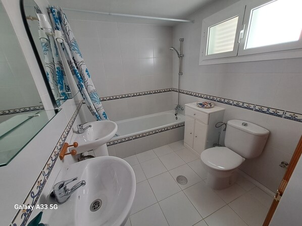 Hair dryer, towels, soap, toilet paper