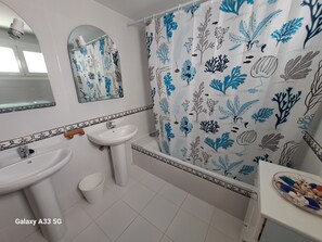Hair dryer, towels, soap, toilet paper