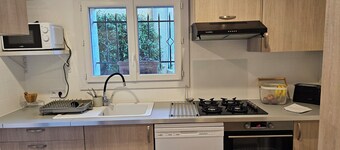 Superbe Appartement Neuf, 4 Couchages, Jardin et vue Mer, au Cœur du Village !