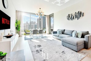 Apartamento | Área de estar | TV de tela plana
