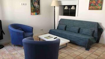 House | Living area | TV, fireplace