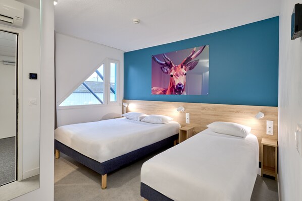 A hotel room with two beds, a large window, and a wall-mounted artwork of a deer. - Kyriad ECO - Narbonne Sud (Narbonne)